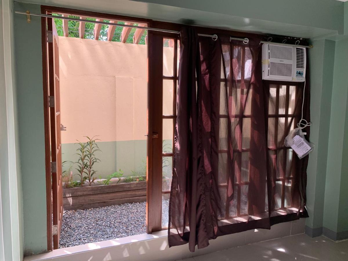 Beinte Singko De Marso Apartments Candon ภายนอก รูปภาพ