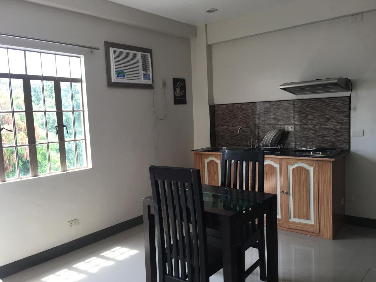 Beinte Singko De Marso Apartments Candon ภายนอก รูปภาพ